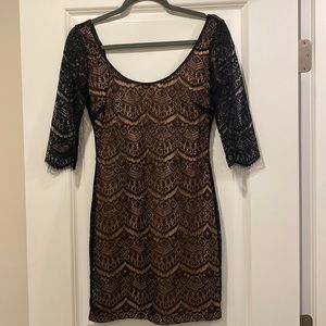 Black lace with nude underneath. Guess brand. Size 0.